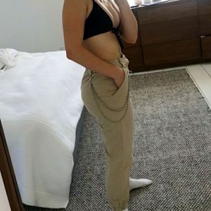 Beige cargo pants with chain